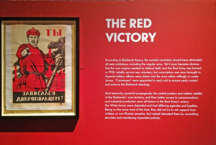 Russian Revolution, exhibition at the British Library, Red Army recruitment poster and wall text.wall text