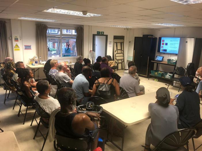 Residents of St. Raphael's estate viewing the ASH film, The Costs of Estate Regeneration